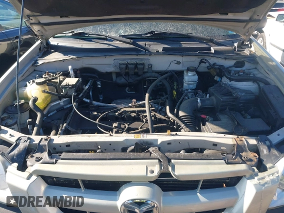 2006 Mazda Tribute i with VIN 4F2YZ92Z66KM10050, listed as a IAAI auction lot 41346153 with 139,668 mi miles and . Bid and sale history available at carsss.com. Image 10.