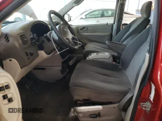 2005 Dodge Caravan SXT with VIN 2D4GP44L65R120861, listed as a Copart auction lot 57040565 with 244,971 mi miles and Salvage title. Bid and sale history available at DreamBid. Image 7.