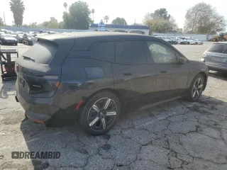 2023 BMW iX xDrive50 with VIN WB523CF0XPCL59062, listed as a Copart auction lot 43813935 with 7,788 mi miles and Salvage Title. Bid and sale history available at carsss.com. Image 3.