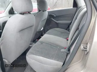 2003 Ford Focus LX with VIN 1FAFP33P33W267575, listed as a IAAI auction lot 41804406 with 106,957 mi miles and . Bid and sale history available at carsss.com. Image 8.