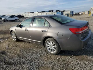 2012 Lincoln MKZ with VIN 3LNHL2GC1CR804460, listed as a Copart auction lot 43977715 with 104,186 mi miles and Salvage Title. Bid and sale history available at DreamBid. Image 2.