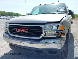 2005 GMC Yukon SLT z VIN 1GKEK13T35R127330, wystawiony jako IAAI lot #42138030 z przebiegiem 195 079 mil mil oraz . Historia ofert i sprzedaży dostępna na DreamBid. Obrazek 12.