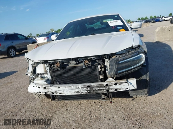 2015 Dodge Charger SXT with VIN 2C3CDXHG8FH730145, listed as a IAAI auction lot 42039927 with 156,135 mi miles and . Bid and sale history available at DreamBid. Image 13.