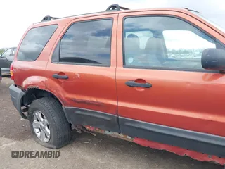 2006 Ford Escape XLT with VIN 1FMYU03126KA17323, listed as a IAAI auction lot 42048363 with 119,296 mi miles and . Bid and sale history available at DreamBid. Image 6.