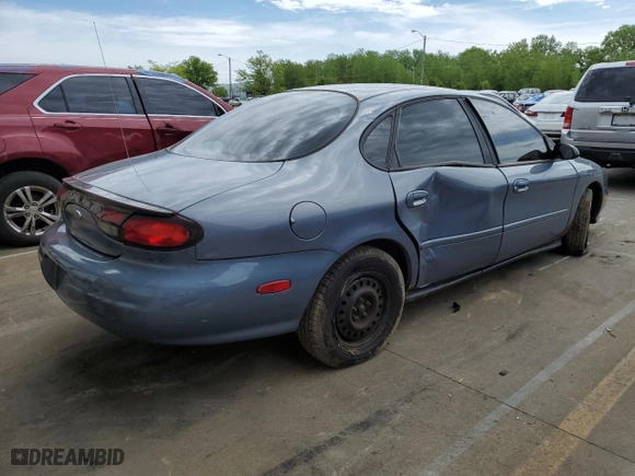 1999 Ford Taurus LX with VIN 1FAFP52UXXA159704, listed as a Copart auction lot 52350774 with 112,562 mi miles and Salvage Title. Bid and sale history available at carsss.com. Image 6.