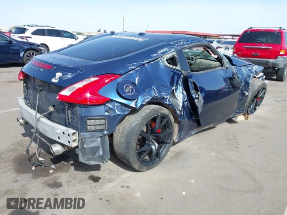 2013 Nissan 370Z z VIN JN1AZ4EH2DM380511, wystawiony jako IAAI lot #41912193 z przebiegiem Nie podano mil oraz . Historia ofert i sprzedaży dostępna na DreamBid. Obrazek 4.