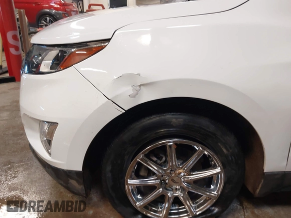 2019 Chevrolet Equinox LT z VIN 2GNAXUEV0K6182506, wystawiony jako IAAI lot #41377011 z przebiegiem 96 085 mil mil oraz . Historia ofert i sprzedaży dostępna na DreamBid. Obrazek 6.
