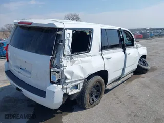 2020 Chevrolet Tahoe Commercial with VIN 1GNSKDEC5LR261015, listed as a IAAI auction lot 42001083 with 110,668 mi miles. Bid and sale history available at carsss.com. Image 4.