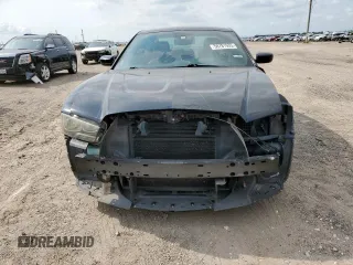 2014 Dodge Charger SXT z VIN 2C3CDXHGXEH295353, wystawiony jako Copart lot #58781935 z przebiegiem 181 199 mil mil oraz Szkoda całkowita • Salvage title. Historia ofert i sprzedaży dostępna na DreamBid. Obrazek 5.