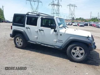 2014 Jeep Wrangler Unlimited Sport z VIN 1C4BJWDG6EL115627, wystawiony jako IAAI lot #42245390 z przebiegiem 121 944 mil mil oraz . Historia ofert i sprzedaży dostępna na DreamBid. Obrazek 1.