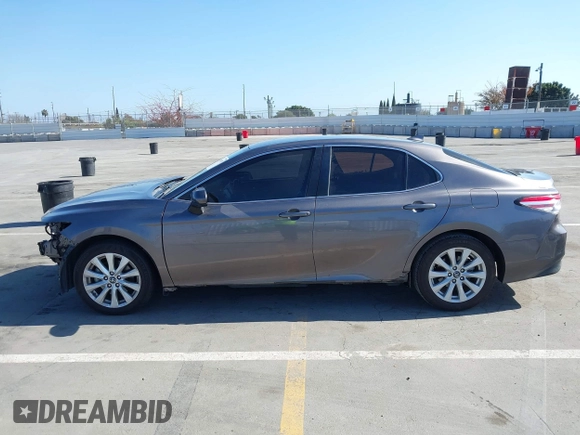 2019 Toyota Camry LE with VIN 4T1B11HK2KU240465, listed as a IAAI auction lot 42095075 with 67,852 mi miles and . Bid and sale history available at DreamBid. Image 15.
