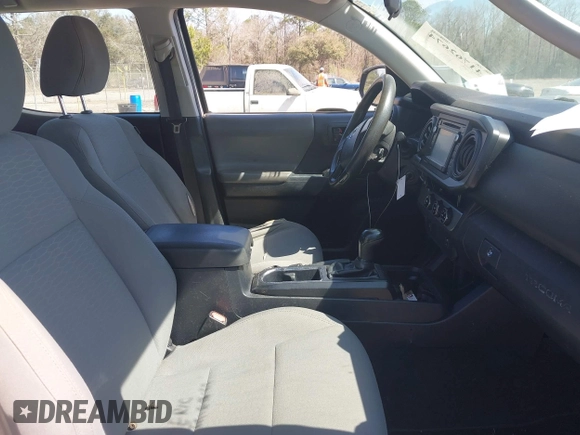 2017 Toyota Tacoma SR with VIN 5TFAX5GN7HX101599, listed as a IAAI auction lot 41762674 with 160,973 mi miles. Bid and sale history available at carsss.com. Image 5.