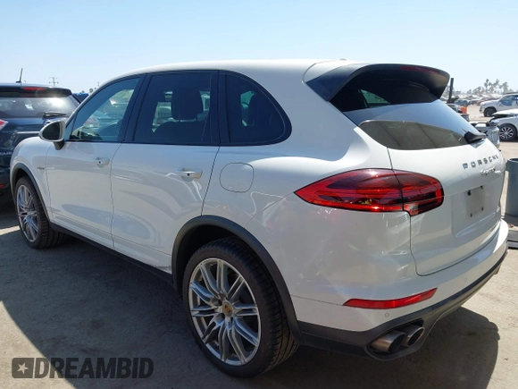 2016 Porsche Cayenne S E-Hybrid with VIN WP1AE2A25GLA63734, listed as a IAAI auction lot 42549379 with 155,065 mi miles and . Bid and sale history available at DreamBid. Image 3.