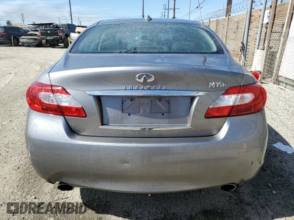 2012 Infiniti M Hybrid with VIN JN1EY1APXCM910481, listed as a Copart auction lot 52943285 with Not Provided miles and Salvage Title. Bid and sale history available at DreamBid. Image 6.