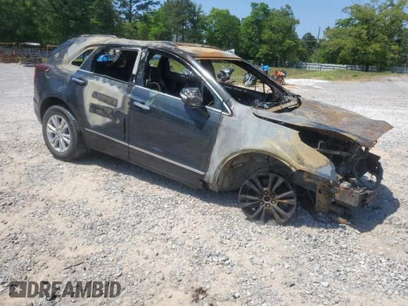 2021 Cadillac XT5 FWD Luxury with VIN 1GYKNAR40MZ144522, listed as a Copart auction lot 53457035 with Not provided miles and Non repairable. Bid and sale history available at DreamBid. Image 4.