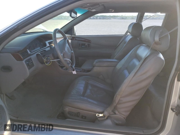 2000 Cadillac Eldorado Touring with VIN 1G6ET1295YU145248, listed as a Copart auction lot 82160574 with 87,294 mi miles and Salvage Title. Bid and sale history available at DreamBid. Image 7.