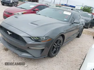 2021 Ford Mustang EcoBoost z VIN 1FA6P8TH9M5141038, wystawiony jako IAAI lot #41965588 z przebiegiem 35 344 mil mil oraz . Historia ofert i sprzedaży dostępna na DreamBid. Obrazek 17.