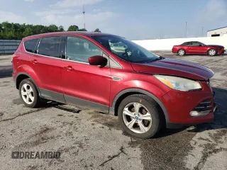 2013 Ford Escape SE with VIN 1FMCU0GX1DUB90907, listed as a Copart auction lot 57789785 with 113,525 mi miles and Salvage title. Bid and sale history available at DreamBid. Image 4.