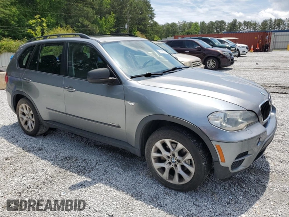 2012 BMW X5 35i with VIN 5UXZV4C50CL991452, listed as a Copart auction lot 56890265 with 147,019 mi miles and Salvage title. Bid and sale history available at DreamBid. Image 4.