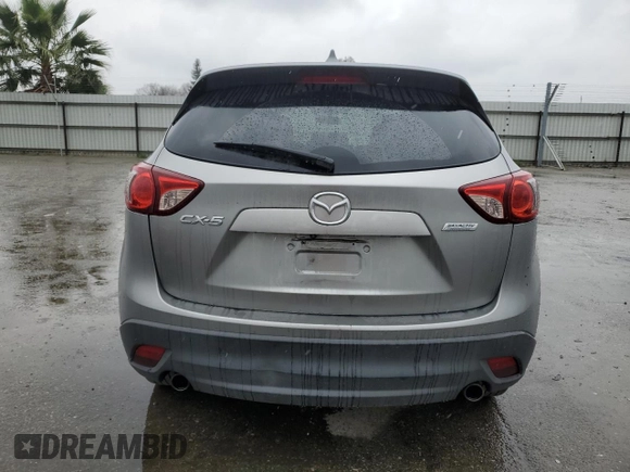 2015 Mazda CX-5 Touring with VIN JM3KE2CY4F0469096, listed as a Copart auction lot 48075105 with 131,788 mi miles and Salvage Title. Bid and sale history available at carsss.com. Image 6.