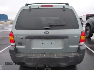 2006 Ford Escape XLT with VIN 1FMYU03126KC55897, listed as a IAAI auction lot 41733243 with 136,989 mi miles. Bid and sale history available at carsss.com. Image 16.
