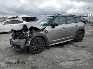 2018 MINI Countryman Cooper S E with VIN WMZYU7C47J3E56482, listed as a Copart auction lot 48877985 with 60,829 mi miles and Salvage Title. Bid and sale history available at carsss.com. Image 1.