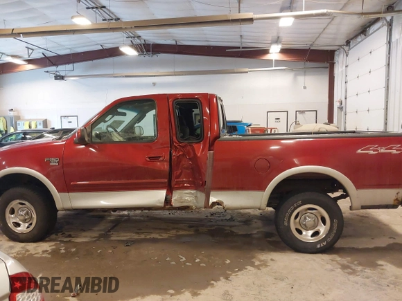 2003 Ford F-150 XL with VIN 1FTRX18L33NB82694, listed as a IAAI auction lot 41612431 with 179,664 mi miles. Bid and sale history available at carsss.com. Image 14.