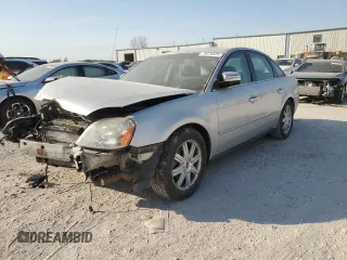 2005 Ford Five Hundred Limited with VIN 1FAFP25165G128086, listed as a Copart auction lot 75576824 with 194,715 mi miles and Salvage Title. Bid and sale history available at carsss.com. Image 1.
