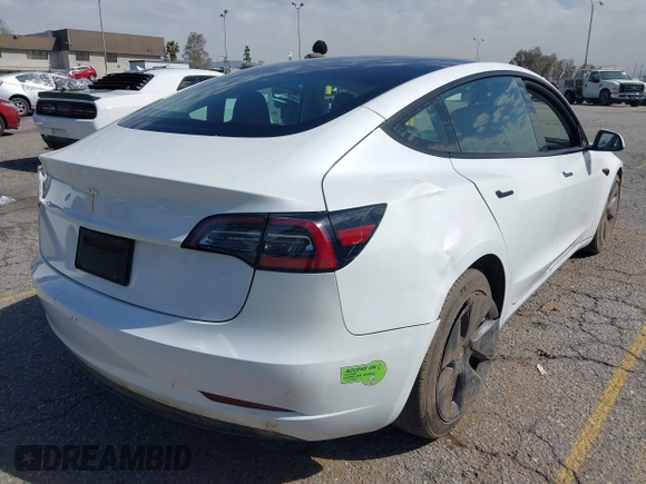 2023 Tesla Model 3 with VIN 5YJ3E1EA8PF398110, listed as a IAAI auction lot 41692006 with 112,699 mi miles and . Bid and sale history available at carsss.com. Image 6.