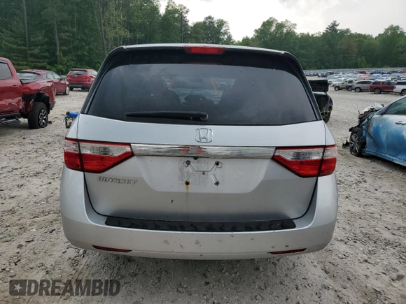 2013 Honda Odyssey LX z VIN 5FNRL5H24DB054216, wystawiony jako Copart lot #59871675 z przebiegiem 103 494 mil mil oraz Czysty tytuł • Clean title. Historia ofert i sprzedaży dostępna na DreamBid. Obrazek 6.