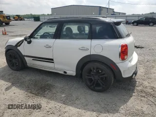 2014 MINI Countryman S with VIN WMWZC3C53EWP27156, listed as a Copart auction lot 59579765 with 159,308 mi miles and Salvage title. Bid and sale history available at DreamBid. Image 2.