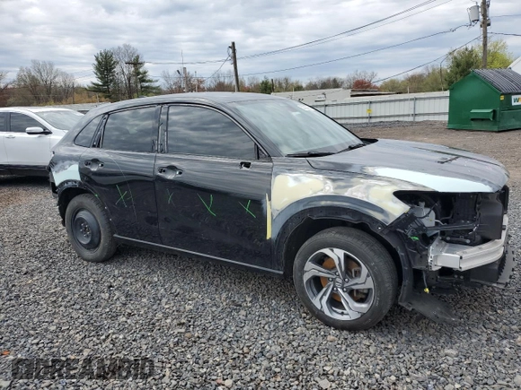 2023 Honda HR-V EX-L with VIN 3CZRZ2H74PM718629, listed as a Copart auction lot 52628595 with 104,108 mi miles and Salvage title. Bid and sale history available at DreamBid. Image 4.