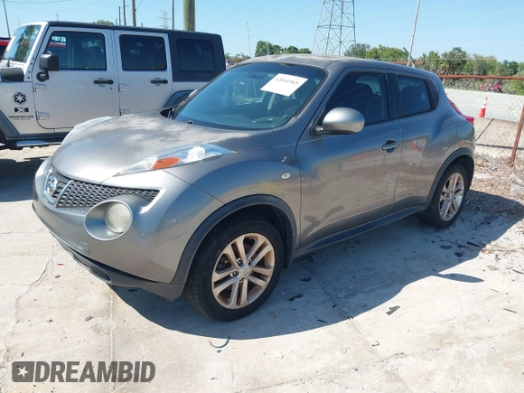 2014 Nissan Juke S with VIN JN8AF5MRXET353882, listed as a IAAI auction lot 42041965 with 239,606 mi miles. Bid and sale history available at carsss.com. Image 2.