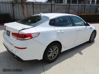 2019 Kia Optima LX with VIN 5XXGT4L36KG329998, listed as a Copart auction lot 52011715 with 123,942 mi miles and Salvage Title. Bid and sale history available at carsss.com. Image 3.