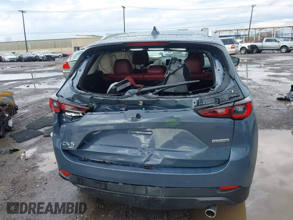 2024 Mazda CX-5 S Carbon Edition z VIN JM3KFBCL1R0470051, wystawiony jako IAAI lot #42088186 z przebiegiem 10 285 mil mil oraz . Historia ofert i sprzedaży dostępna na DreamBid. Obrazek 16.