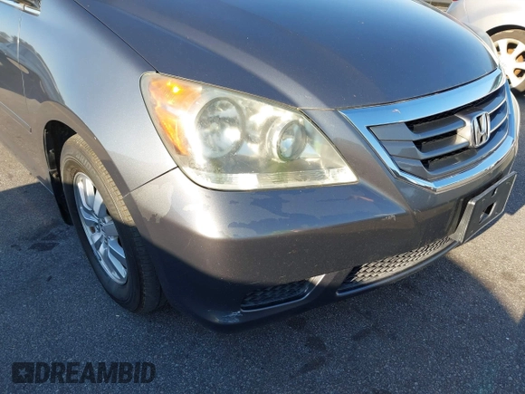 2010 Honda Odyssey EX-L with VIN 5FNRL3H76AB010388, listed as a IAAI auction lot 41678322 with 197,826 mi miles and . Bid and sale history available at carsss.com. Image 14.
