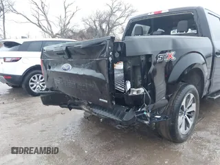 2019 Ford F-150 XL with VIN 1FTEW1CPXKKD88784, listed as a IAAI auction lot 41229831 with 83,384 mi miles and . Bid and sale history available at carsss.com. Image 6.