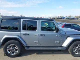 2020 Jeep Wrangler Unlimited Sahara with VIN 1C4HJXENXLW230207, listed as a IAAI auction lot 41507141 with 1 mi miles. Bid and sale history available at carsss.com. Image 12.