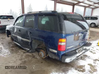 2001 GMC Yukon SLT with VIN 1GKEK13T21J168167, listed as a IAAI auction lot 41584040 with 1 mi miles. Bid and sale history available at carsss.com. Image 3.