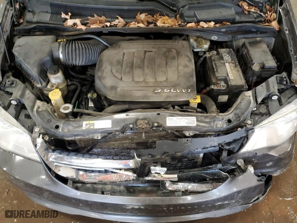 2015 Dodge Grand Caravan SE with VIN 2C4RDGBG3FR652737, listed as a Copart auction lot 73220174 with 292,018 mi miles and Clean Title. Bid and sale history available at carsss.com. Image 12.