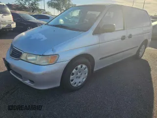 2001 Honda Odyssey LX with VIN 2HKRL18501H617598, listed as a Copart auction lot 65471805 with 125,298 mi miles and Clean title. Bid and sale history available at DreamBid. Image 1.