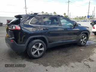 2019 Jeep Cherokee Limited z VIN 1C4PJLDBXKD302450, wystawiony jako Copart lot #54840495 z przebiegiem 141 148 mil mil oraz Nie do naprawy • Non repairable. Historia ofert i sprzedaży dostępna na DreamBid. Obrazek 3.
