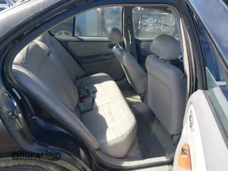 1999 Nissan Altima XE with VIN 1N4DL01D2XC124747, listed as a IAAI auction lot 41750853 with 110,221 mi miles. Bid and sale history available at carsss.com. Image 8.