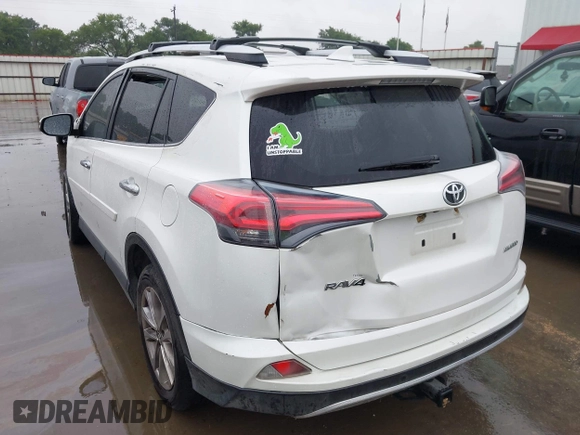2016 Toyota RAV4 Limited with VIN JTMYFREV6GJ061593, listed as a IAAI auction lot 42188936 with 180,361 mi miles and . Bid and sale history available at DreamBid. Image 3.