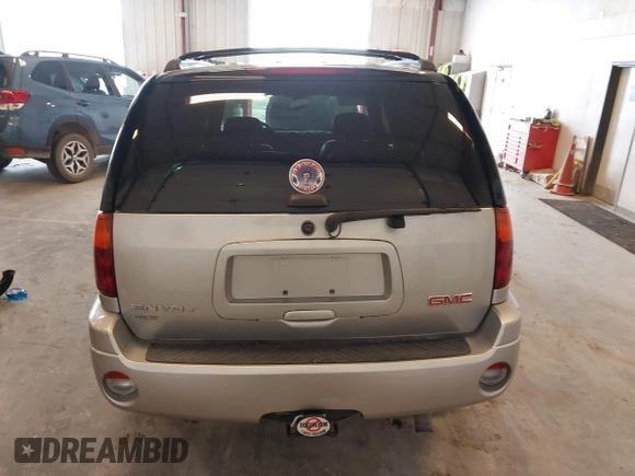 2007 GMC Envoy SLE z VIN 1GKDT13S572152757, wystawiony jako IAAI lot #42095239 z przebiegiem 50 510 mil mil oraz . Historia ofert i sprzedaży dostępna na DreamBid. Obrazek 16.