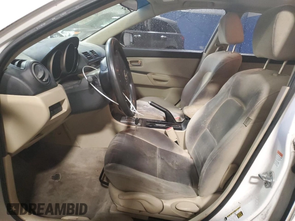 2007 Mazda 3 i Touring with VIN JM1BK32G971669774, listed as a Copart auction lot 51619175 with 136,198 mi miles and Salvage Title. Bid and sale history available at DreamBid. Image 7.