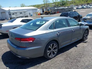 2021 Volkswagen Passat SE with VIN 1VWSA7A39MC011507, listed as a IAAI auction lot 42160879 with 82,639 mi miles and . Bid and sale history available at DreamBid. Image 4.