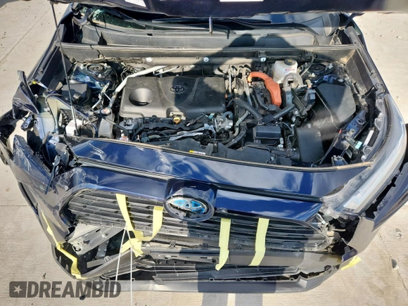 2022 Toyota RAV4 Hybrid XLE with VIN 2T3RWRFV0NW138427, listed as a Copart auction lot 60860815 with 27,772 mi miles and Salvage title. Bid and sale history available at DreamBid. Image 12.