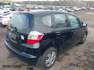 2010 Honda Fit with VIN JHMGE8H29AC037888, listed as a IAAI auction lot 41784180 with 64,855 mi miles. Bid and sale history available at carsss.com. Image 4.