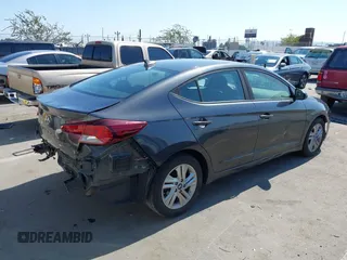 2020 Hyundai Elantra SEL with VIN 5NPD84LF2LH557534, listed as a IAAI auction lot 42481617 with 98,796 mi miles and . Bid and sale history available at DreamBid. Image 4.